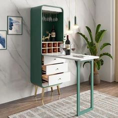 a room with a desk, wine rack and potted plant on the floor in front of it