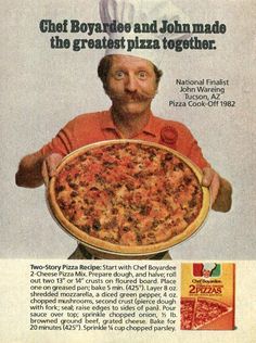 an old advertisement for pizza with a man holding up a large pizza in front of him