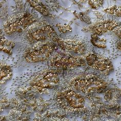 Price: The price is for 1yard.1 yard=125cm wide*91cm length,if you buy more than 1 yard,it don't cut , in one piece the longest is 15 yards. we also make wholesale, wholesale start 15 yards. Material: beads,metallic,pearls ,polyester Wide : 125cm (or 49 inches) color: Gold Shipping: shipping by China post air mail;if you need ship by other way,just contact me Use for Dress,clothing and some others Rim: two sides are flowers shape Very importantwhen you make an order,please write down you phone N Elegant Embroidered Fabric With Lace Work For Party, Elegant Embroidered Fabric With Lace Work For Banquet, Elegant Festive Fabric And Notions For Parties, Gold Sequined Lace For Party, Elegant Beaded Lace For Party, Party Gold Lace With Sequins, Beaded Lace Embroidered Fabric For Banquet, Beaded Lace Sequin Fabric For Banquet, Elegant Gold Fabric And Notions For Party