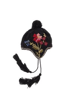 Inspired by vintage textiles, the Ruthie Earflap combines cross stitch and stab stitches to create an artistic floral motif. Every stitch tells a story of skill, passion, and enduring beauty. Pair with our Ruthie Handwarmers for a coordinating look! 100% wool. Fleece Lined. Handmade in Nepal. Hand Accessories, French Knot, Seasonal Gifts, Vintage Textiles, Floral Motif, Hand Warmers, 9 And 10, Nepal, Cross Stitch