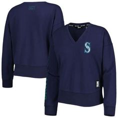 Upgrade your collection of official Seattle Mariners apparel by picking up this Lily pullover sweatshirt from DKNY Sport. It features a stylish V-neck and the team's unmistakable logo, which means you can make a fashion statement while showing your support for your beloved squad. The relaxed feel of this lightweight top is sure to make it your next go-to option for Seattle Mariners game day. V-neck Machine wash, tumble dry low Officially licensed Pullover Embroidered Logo Long sleeve Screen prin V-neck Tops For College In Winter, Cotton V-neck Sweater For College, Sporty Cotton V-neck Sweatshirt, V-neck Sweatshirt For Fall Streetwear, Casual Blue V-neck Sweatshirt, Fall College V-neck Tops, Fall V-neck Tops For College, Casual V-neck College Sweatshirt, Cotton V-neck Sweater For Streetwear