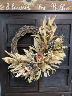 a wreath on the front door of a house