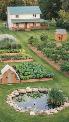 an aerial view of a garden with lots of green plants and small houses in the background