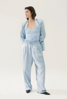 Combining our love for silk with twill cotton, the Silk Twill Slouch Pants are a modern take on an 80s classic. With an elastic waistband, pleated front, and internal lining, our latest design introduces pants to be worn every day, no matter the occasion. Dress it up with our Boyfriend Shirts, or keep it casual with a Spring Silk Wide Leg Pants With Elastic Waistband, Casual Silk Wide Leg Pants For Spring, Silk Bottoms For Spring Daywear, Spring Silk Bottoms For Daywear, Spring Silk Pants, Spring Silk Loungewear Pants, Spring Silk Lounge Pants, Silk Pants With Elastic Waistband For Spring, Silk Loungewear Pants For Spring