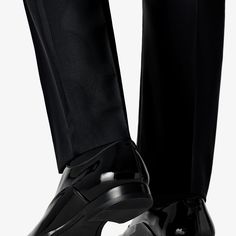 A proper tux isn't complete without a pair of classic black patent leather lace-ups. Thanks to their slim profile, our calf leather Blake-stitched shoes lend a contemporary finish to the traditional black-tie attire. Modern Fitted Oxfords With Pointed Toe, Sleek Black Patent Leather Loafers, Modern Black Loafers For Formal Occasions, Modern Fitted Oxfords With Leather Sole, Modern Formal Dress Shoes With Pointed Toe, Modern Fitted Wingtip Oxfords, Sleek Patent Leather Dress Shoes With Round Toe, Timeless Fitted Formal Loafers, Black Patent Leather Wingtip Dress Shoes