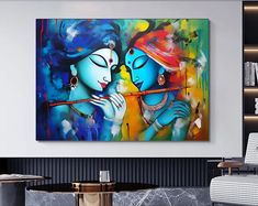 a painting on the wall of a living room with two women holding a flute in their hands