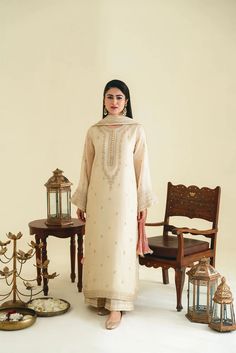 A traditional design, 'Taree' is adorned with beautifully delicate zari embroideries in silk thread on a celestial beige base. Paired with a crushed pure silk hand dip dyed dupatta, and embroidered culottes trouser, this is an elegant semi-formal look perfect for your celebratory events. Order Duration: 4 to 6 weeks Long Kameez, Agha Noor, Dip Dyed, Indian Outfit, Formal Looks, Silk Thread, Wedding Wear, Raw Silk, Indian Wear