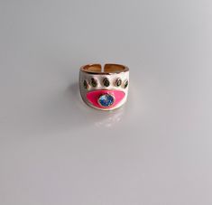 Gorgeous enamel Ring! This ring is more than a fashion statement, it is also a beautiful piece of artwork! Grab yours today! Specifications: . Enamel - Turquoise and Blue Evil Eye Ring . Adjustable Trendy Pink Enamel Ring For Gift, Trendy Pink Enamel Ring As Gift, Gold Enamel Hand Painted Rings, Hand Painted Gold Enamel Rings, Hand Painted Enamel Gold Rings, Adjustable Pink Enamel Rings, Pink Enamel Rings For Gift, Trendy Open Enamel Ring For Gift, Trendy Open Enamel Ring As Gift