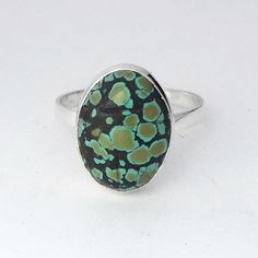 "This ring features a natural turquoise carved scarab bezel set in sterling silver. The carved scarab turquoise stones are vintage from the 1960's and vary in color and pattern but all are gorgeous. The carving is on the top and the underside of the scarab. The bezel has an open back so you can also see the carving on the underside. Each turquoise scarab is 16x12mm (.62\" inch). In ancient Egypt the scarab was a symbol of transformation and protection. If you would like this ring in a size not o Green Turquoise Ring With Patina In Sterling Silver, Oval Silver Chrysocolla Turquoise Ring, Oval Turquoise Chrysocolla Ring In Silver, Oval Turquoise Inlay Rings, Oval Turquoise Rings With Inlay, Artisan Turquoise Cabochon Ring, Unique Turquoise Ring With Cabochon, Turquoise Oval Ring With Patina, Spiritual Oval Turquoise Ring With Natural Stones