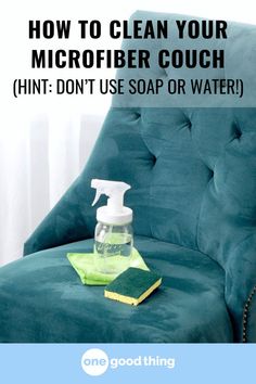 a bottle of soap sitting on top of a green chair