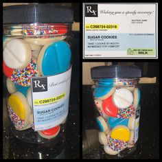 two jars filled with cookies and sprinkles on top of a black counter