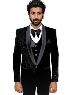 Elevate your style with this Exquisite Black Hand-Embroidered 6-Piece Tuxedo Suit for Men, a true testament to the harmonious blend of classic and modern fashion. The timeless black color exudes an enduring elegance, while the intricate hand embroidery adds a touch of individuality and personalization, making it a standout piece in your wardrobe. This comprehensive ensemble includes all the essential elements to achieve a complete and polished look, leaving nothing to chance. From the perfectly tailored jacket to the impeccably designed pants, vest, shirt, bow tie, and pocket square, every component reflects a commitment to impeccable style and attention to detail. The quality craftsmanship and meticulous workmanship that go into creating this tuxedo suit are unrivaled. It's a must-have fo Traditional Black Blazer For Groom, Luxury Black Ceremonial Sets, Tuxedo Suit For Men, Yacht Party, Tuxedo Suit, Wedding Suits Men, Tailored Jacket, Black Hand, Linen Blazer