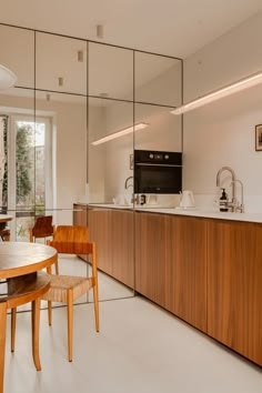 the kitchen is clean and ready to be used as a dining room or office space