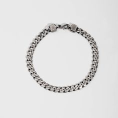 "5mm curb chain bracelet for men in oxidized sterling silver with a unique handmade hook at closure. An everyday piece of jewelry and a great choice as a Christmas gift for him. 100% handcrafted with love! F E A T U R E S * Metal: High-quality Sterling Silver 925 * Finish: Oxidized Silver * Style: Curb * Width: 5mm * Length: 19 - 23cm (7.5 - 9 inches) Sterling silver parts of the jewels are gold plated or rhodium plated in order to be strong, durable and resistant to tarnish. 100% nickel free. D Everyday Sterling Silver Cuban Link Bracelet With Curb Chain, Gunmetal Box Chain Bracelet As A Gift, Minimalist Silver Cuban Link Bracelet With Curb Chain, Gunmetal Link Jewelry With Curb Chain, Everyday Silver Cuban Link Bracelet With Box Chain, Minimalist Silver Cuban Link Chain Bracelet, Gunmetal Chain Link Bracelet As Gift, Classic Cuban Link Jewelry With Stainless Steel Clasp, Minimalist Silver Cuban Link Bracelet