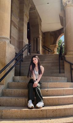 posing on stairs, stairs pose, downtown girl outfit, historical stairs, europe stairs, europe pose inspo, sitting down pose, converse xc motion, green cargo pants, cargo pants outfit, cargo fit Pictures On Stairs, Sitting Down Pose, Pose Poto, Ideas Selfies, Cargo Fit, Studio Photography Poses, Bff Photoshoot Poses, Cargo Pants Outfit