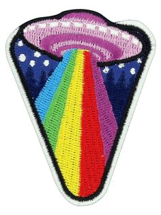 a patch with an image of a rainbow in the center and stars around it, on top of a white background