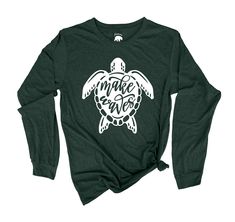 ⭑ Make Waves Sea Turtle long sleeve shirts ⭑ AMERICAN BEAR CUB® ADULT UNISEX SOFT LONG SLEEVE SHIRTS An essential for every age, our newest adult unisex super soft long sleeve shirts fit like a well-loved favorite, featuring a crew neck and long sleeves. Designed with superior ring-spun cotton, rayon and poly giving you that amazingly soft feel that makes you wish you could wrap yourself up in them (feel free to do so). - Unisex sizing - Fabric is 25% combed & ring-spun ethically sourced cotton, Graphic Tee With Front Print Long Sleeve, Long Sleeve Graphic Tee With Front Print, Green Long Sleeve Pre-shrunk T-shirt, Green Pre-shrunk Long Sleeve Top, Green Long Sleeve Shirt With Letter Print, Green Long Sleeve Screen Print T-shirt, Green Long Sleeve Shirt With Screen Print, Artwork Light, Light Artwork