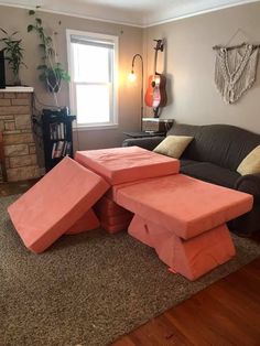 a living room filled with furniture and a fire place