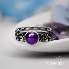 Sterling Silver Unique Periwinkle Flower Ring  | Moonkist Designs | Moonkist Designs Mystical Round Cabochon Jewelry, Mystical Silver Amethyst Ring, Spiritual Amethyst Ring With Gemstone Accents, Purple Moonstone Round Jewelry, Round Cabochon Amethyst Ring, Adjustable Amethyst Ring With Stone Setting, Sterling Silver Cabochon Amethyst Ring, Mystical Round Amethyst Ring For Gifting, Mystical Round Amethyst Ring Gift