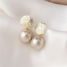 Enliven your ensemble with these drop earrings starring gleaming pearls that dangle from etched 18k gold-plated circles above. 0.63" W x 1.26" L 18k gold-plated copper / pearl Valentines Accessories, Wholesale Earrings, Big Pearl, Romantic Jewellery, Earring Type, Pearl Earrings Dangle, Pearl Stud Earrings, Water Drop, Pearl Studs