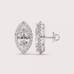 3.44tcw Marquise Solitaire Halo 14K White Gold Screwback Earring set ✤𝐃𝐢𝐚𝐦𝐨𝐧𝐝 𝐃𝐞𝐭𝐚𝐢𝐥𝐬 Color: FG Clarity: VS1 Shape: Marquise Cut Carat Weight: 3.06 CTW Type: Lab Grown Diamonds (CVD/HPHT) ✤ 𝐒𝐢𝐝𝐞 𝐃𝐢𝐚𝐦𝐨𝐧𝐝 𝐃𝐞𝐭𝐚𝐢𝐥𝐬 Color: EF Clarity: VS1 Shape: Round Carat Weight: 0.38 CT Type: Lab Grown Diamonds (CVD/HPHT) ✤Metal 𝐃𝐞𝐭𝐚𝐢𝐥𝐬 Metal Purity: Solid 14K Gold Metal Tone: Yellow, White, Rose Stamp/Hallmark: Yes Jewelry Certificate: Free of Cost with Listed Design Marquise Solitaire, Jewelry Certificate, Wedding Jewelry Earrings, Marquise Cut, Screw Back Earrings, Wedding Earrings, Lab Grown, Lab Grown Diamonds, Earring Set