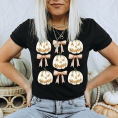 You can't go wrong with a cute graphic tee! Spooky season is here! Our 100% cotton unisex tees are a crowd favorite.  * 100% cotton  * Sport Grey is 90% cotton, 10% polyester  * Ash Grey is 99% cotton, 1% polyester  * Heather colors are 50% cotton, 50% polyester **Please note that due to lighting and positioning the graphic size and shirt color in the model product photo may differ a bit from the actual shirt, please see the photos with the checkered backgrounds for the truest representation.** Returns are not accepted at this time unless there is a printing error. Please see our size chart in listing photos. :)  This product is made especially for you as soon as you place an order, which is why it takes us a bit longer to deliver it to you. Making products on demand instead of in bulk hel Novelty T-shirt With Funny Print For Fall, Fall Cotton T-shirt With Character Print, Fall Novelty T-shirt With Funny Print, Funny Print Novelty T-shirt For Fall, Cotton Character Print T-shirt For Fall, Cotton T-shirt With Character Print For Fall, Novelty Short Sleeve Tops For Fall, Short Sleeve T-shirt With Character Print For Fall, Preppy Halloween