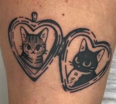 two heart shaped tattoos with cats in them