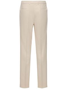 Front button and concealed zip closure. Belt loops. Two side pockets. Model is wearing a size48 Elegant Chinos For Workwear With Straight Hem, Chic Business Casual Bottoms With Hidden Button Closure, Elegant Chinos With Pressed Crease And Straight Hem, Elegant Chinos With Belt Loops And Straight Hem, Elegant Wide Leg Chinos With Belt Loops, Elegant Straight Hem Chinos With Belt Loops, Elegant Business Casual Chinos With Straight Hem, Elegant Tailored Wide Leg Chinos, Elegant Straight Hem Chinos