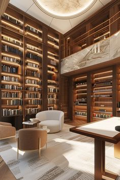 a room with many bookshelves and two chairs in front of a table that is on top of a rug