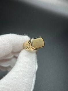 This is our unique nugget signet ring with a sleek matte finish.  - Made with solid 10KT gold  - Stamped "10KT" for authenticity - Made to order in any finger size, please allow 1-2 weeks for production Wear with love and care <3 ------------------------------------ SHIPPING POLICY - Items in stock ship typically within 1-3 business days.  - Certain items ordered in specific sizes/lengths (such as most of our rings) are made to order and require 5-10 business days to manufacture and ship thereaf Yellow Gold Nugget Signet Ring Gift, Yellow Gold Nugget Signet Ring, Gold Nugget Signet Ring Stamped 14k, 14k Gold Nugget Signet Ring For Anniversary, Classic Gold Nugget Ring, Classic Hallmarked Nugget Jewelry, Formal Nugget Shaped Signet Ring With Polished Finish, Formal 14k Gold Nugget Signet Ring, Classic Yellow Gold Nugget Ring