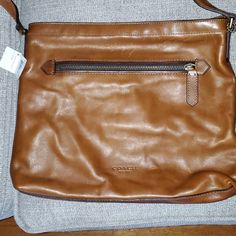 Never Used Coach Messenger Bag Men, Coach Crossbody Bag Men, Coach Rectangular Brown Coin Purse, Coach Bag Men, Coach Brown Coated Canvas Bags, Coach Men’s Cross Body Bag, Messenger Bag Men, Man Shop, Color