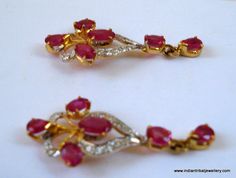 "14k GOLD EARRINGS EAR STUD FROM RAJASTHAN INDIA, GREAT HANDMADE DESIGN MADE OF 14K YELLOW GOLD SATED REAL A QUALITY RUBY & DIAMOND GEM STONES, NICE PIECE GOOD FOR JEWELRY COLLECTION. Height max. - 2.8 cm(1.1\") width max. - 1.2 cm(0.47\") Total weight - 3 grams Material - 14 carat solid yellow gold & real gem stones." Traditional 17 Jewel Diamond Earrings For Anniversary, Yellow Gold Ruby Earrings With Diamond Accents, Gold Ruby Earrings With Diamond Accents, Gold Earrings With Gemstone And American Diamond, Ruby Earrings For Anniversary And Festive Occasions, Festive Ruby Earrings For Anniversary, Earrings Diamond, Earrings Ear, Ear Stud