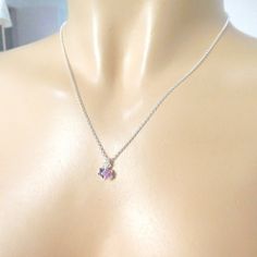 "925 Sterling Silver star charm necklace. One charm is an amethyst and the other one is rose quartz. If you prefer a different stone combination, please contact us! Please choose your favorite necklace length at checkout. All lengths have a one inch extender, that way you'll have some wiggle room to play with the length. For example, if you choose a 14 inches necklace length, you'll have options to close the necklace at any length between 14 inches and 15 inches. ⇒ MATERIALS Entirely made of .92 Dainty Pendant Crystal Necklace For Her, Dainty Silver Crystal Necklaces As Gift, Dainty Crystal Pendant Necklace As Gift For Her, Dainty Sterling Silver Crystal Gemstone Necklace, Delicate Sterling Silver Birthstone Pendant Necklace, Dainty Sterling Silver Crystal Necklace For Gift, Dainty Silver Crystal Pendant Necklace, Delicate Purple Sterling Silver Jewelry, Silver Dainty Birthstone Charm Necklaces