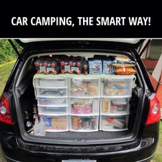 an image of the back of a car with its trunk full of food and drinks