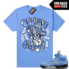 "UNC 5s Jordan matching shirt by Sneaker Match Tees brand. Official Sneaker Match Tees shirt designed to match the Jordan 5 \"UNC\" retro sneakers. *Sneakers are for matching purposes only, NOT included in the sale* True to size Men's shirt 100% Soft Cotton Regular Fit" Blue Casual Sneakers With Graphic Print, Casual Blue Sneakers With Graphic Print, Blue Sneakers With Graphic Print For Streetwear, Blue Graphic Print Sneakers For Streetwear, Lucky Green, Sneaker Match Tees, Sneaker Tee, Love Sick, University Blue