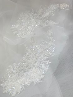 Light Ivory Wedding Lace Applique/Floral Bridal Lace Applique/Pearls Beaded Lace Applique/Top Quality, Sell By Mirror Pair Sell by pairs, please select the quantity you need. Stock Color Light Ivory  Material Rayon, clear sequins，plastic pearls, beads and net Measurements About   This is a very stunning beaded lace pair, very shinning under the light or sunshine. Applique Top, Wedding Lace, Light Ivory, Ivory Wedding, Under The Lights, Floral Bridal, Lace Weddings, Bridal Lace, Beaded Lace