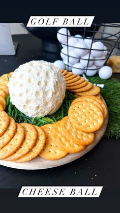 a cheese ball on top of crackers and grass