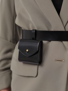 Made in a modern and minimalist aesthetic, the Micro Belt Bag is not only a fashion accessory but also a functional one. Although small, the stylish bag can hold your keys, coins or other small items. With its versatile design, the leather belt bag can be worn with a sporty jumpsuit for an edgy outfit or with a blazer for a chic, elegant look. Bag Size: Height- 7 cm, Width- 8 cm, Depth – 1.5 cm Waist belt width: 3 cm Adjustable using the buckle Designed to be fitted on the waist Diy Belt Bag, Unique Bags Design, Waist Bag Leather, How To Tie Shoes, Edgy Outfit, Waist Purse, Collection Ideas, Soft Leather Handbags, Micro Bag