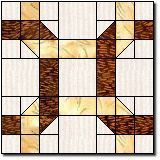 a brown and white quilt with an arrow on the center, surrounded by smaller squares