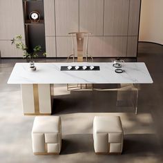 a modern dining table with two stools