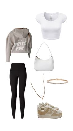 a white shirt, black leggings and sneakers are arranged on top of each other