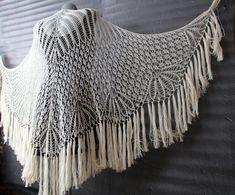 "Ivory/cream shawl with fringe made of soft merino wool silk blended yarn  *Length: 37.7\"(96cm) width about 78,7\"(200cm) *Gorgeous accessory for Boho wedding dress *Can be made as a set for bride and bridesmaids *Other custom colors available! *Wash by hands in warm water, lay flat to dry *Other wedding shawls you can see here: https://www.etsy.com/shop/LacyStories?ref=seller-platform-mcnav&section_id=22735236" Vintage White Shawl Scarf, Bohemian White Pashmina Shawl For Wedding, White Bohemian Pashmina Shawl For Wedding, Handmade Bohemian Cream Shawl, Handmade Cream Bohemian Shawl, Bohemian White Shawl With Fringe, Bohemian Cream Crochet Shawl, White Bohemian Shawl With Fringe, Bohemian Cream Shawl With Fringe