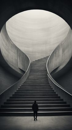 a man standing in front of a set of stairs that lead up to the sky