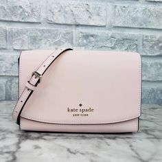 Brand New With The Tag Authentic Color Is Light Rose Gold Tone Hardware Saffiano Pvc Metal Pinmount Logo Two Way Spade Jacquard Lining Interior: Back Slip Pocket Exterior: Back Slip Pocket Flap With Magnetic Snap Closure 6.87"H X 9.12"W X 2.56"D Handle Drop: 6.75" Strap Drop: 22" Same Or Next Day Shipping! Classic Pink Shoulder Bag For Travel, Feminine Pink Bag For On-the-go, Blush Crossbody Bag With Removable Pouch, Blush Crossbody Bag For Travel, Feminine Pink Crossbody Bag, Classic Pink Shoulder Bag With Detachable Strap, Kate Spade Pink Shoulder Bag For Everyday, Blush Crossbody Shoulder Bag For Travel, Kate Spade Pink Bags For Evening