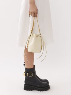 Chloé Marcie Micro Bucket | Chloé US Textured Calf Leather Bucket Bag, Pebbled Leather Bucket Bag With Detachable Strap, Pebbled Leather Bucket Bag, Formal Pebbled Leather Bucket Bag, Chic Pebbled Leather Bucket Bag With Soft Leather, Chic Pebbled Leather Bucket Bag, Pebbled Leather Bucket Bag With Gold-tone Hardware, Pebbled Leather Bucket Bag With Removable Pouch, Calf Leather Bucket Bag With Gold-tone Hardware For Workwear