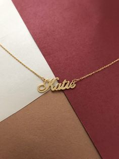 "14k Solid Gold Name Necklace * Gold Name Necklace * Dainty Gold Name Necklace * Name Necklace * Personalized Jewelry * Tiny Name Necklace * *Same day shipping *Made to order *Chain style:Cable chain *Chain Length:14,15,16,17,18,19,20 \" *Finish:14k solid yellowgold , Rose gold , white Gold *personalized gift *Big Discount %60 *All items are on sale *Contact us for more information \"Happy Shopping\" This necklace is for you .Type the name you want to explain.If you have a different question,you Customized Dainty 14k Gold Necklace, Customized 14k Gold Dainty Necklace, Yellow Gold Custom Name Necklace For Birthday, Customized 14k Gold Pendant Necklace, 14k Gold Nameplate Necklace For Birthdays, 14k Gold Pendant Name Necklace As Gift For Her, 14k Gold Name Necklace As Gift For Her, Handmade Yellow Gold Nameplate Necklace, Name Necklace Silver