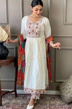 Explore the beauty of white salwar kameez in shades like ivory, off-white, and pearl white. Perfect for festive occasions, weddings, and casual outings, these suits offer premium quality and come in different sizes. Buy now and enjoy up to 50% discounts only at Mirraw! Pair them with colorful dupattas or keep it classic for an effortless look. Shop today and get fast shipping to the USA, UK, and Canada.

#WhiteSalwarSuit #WhiteSalwarKameez #EthnicElegance #TraditionalFashion #MirrawDeals #FastShipping #USAUKCanada #ShopNow White Salwar Suit, White Salwar Kameez, Indian Salwar, Comfortable Fits, Salwar Suits Online, Indian Salwar Kameez, Salwar Kameez Online, Vibrant Patterns, Dresser Makeover