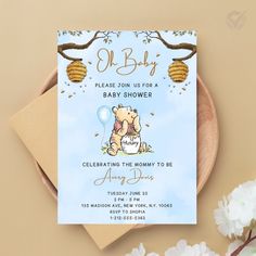 a baby shower card with a bear on it