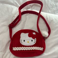 Hello Kitty Small Purse Vintage Handbag Red Velour Rare 2000 Sanrio Smiles Vintage 2000 Sanrio Smiles Hello Kitty Small Purse Handbag Red Velour Rare. Brand New Never Worn Nwt Please See Pictures For Details. Y2k Handbag #Y2k #Hellokitty #Vintage #Vintagehellokitty #Hellokittyplush Cute Red Shoulder Bag With Adjustable Strap, Cute Red Shoulder Bag, Cute Red Shoulder Bag For Everyday Use, Hello Kitty Red Bag For Everyday Use, Angel Accessories, Hello Kitty Handbags, Y2k Handbag, Hello Kitty Bag, Uniqlo Bags