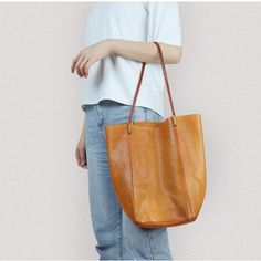 Free U.S. shipping. Style: Vintage , color:Tan, suite for season：Summer, Autumn, Winter ，Music Festival, Travel, Work, Material Genuine Leather, Tan Large Vegetable Tanned Leather Tote Bag Leather Tan Bucket Bag For Errands, Tan Leather Bucket Bag For Errands, Casual Cognac Shoulder Bag With Leather Lining, Casual Cognac Shoulder Bag With Leather Handles, Casual Cognac Leather Shoulder Bag, Light Brown Casual Shoulder Bag For Errands, Casual Light Brown Shoulder Bag For Errands, Large Capacity Tan Leather Shoulder Bag, Casual Leather Bucket Bag In Cognac